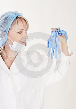 Pretty doctor with gloves