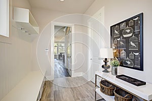 Pretty entrance foyer with an extra long built-in bench