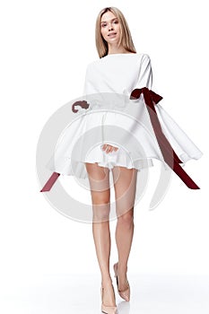 pretty fashion model blond hair woman wear short white dres