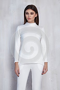 pretty fashion woman wear white casual sport suit trend clothes collection catalogue long brunette hair party style model