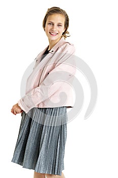 Pretty fashionable stylish teenage girl. Isolated over white background.