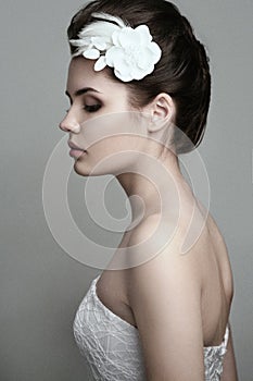 Pretty female with bridal make-up