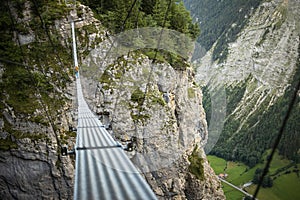 Pretty, female climber on a via ferrata