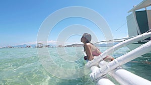 Pretty filipina sightseeing seascape from the boat in the island in Asia.