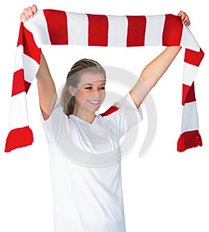 Pretty football fan in white cheering