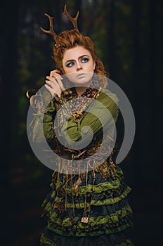 Pretty forest girl with antlers