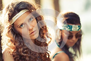 Pretty free hippie girls. Portrait- Vintage effect photo