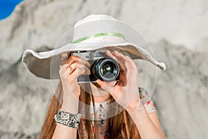 Pretty and funny woman traveler taking photo