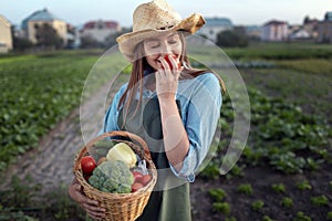 Pretty Gardener Girl Enjoying Smell Vegetables