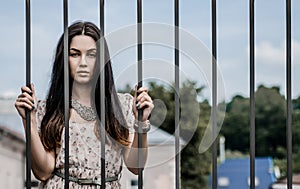 Pretty girl behind the castle gates