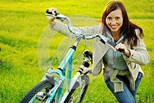 Pretty girl and bicycle