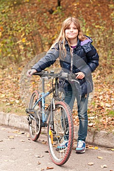 Pretty girl with bicycle