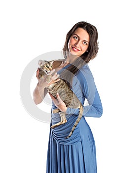 Pretty girl in blue night dress with cat