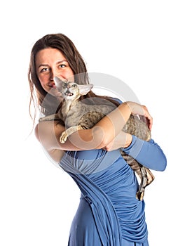 Pretty girl in blue night dress with cat