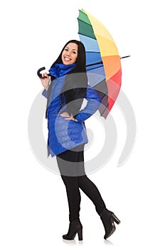The pretty girl in blue winter jacket on