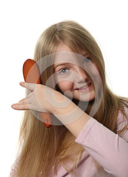 Pretty Girl Combing Her Hair