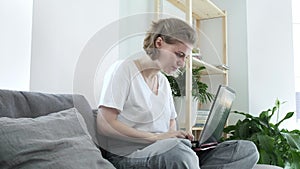 Pretty girl freelancer having unexpected trouble with computer, gets bad news