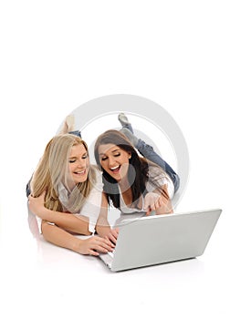 Pretty girl friends surfing in internet