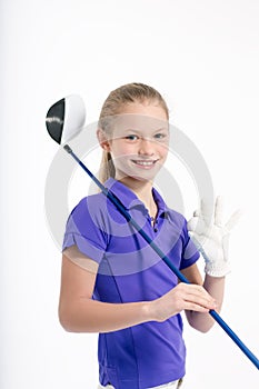 Pretty girl golfer on white backgroud in studio