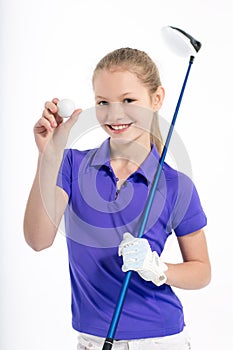 Pretty girl golfer on white backgroud in studio