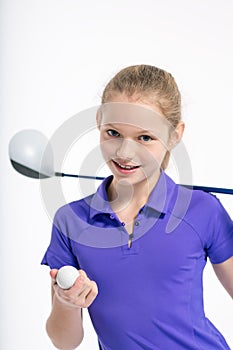 Pretty girl golfer on white backgroud in studio