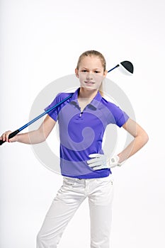 Pretty girl golfer on white backgroud in studio