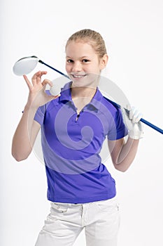 Pretty girl golfer on white backgroud in studio
