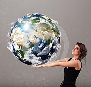 Pretty girl holding 3d planet earth