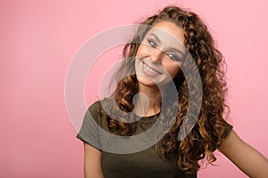Pretty girl isolated on pink background