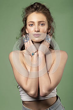 Pretty girl with jewelry on white background