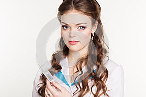 Pretty girl nurse with syringe on white background