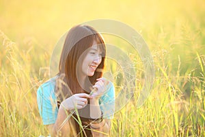 Pretty girl outdoor,beautiful teenage model girl on the field in sun light