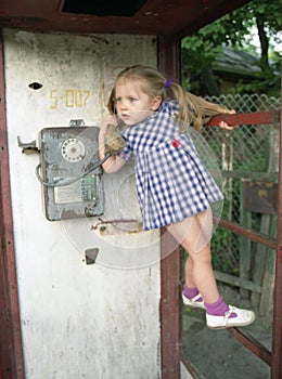 Pretty girl in the phone booth