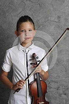 Pretty girl playing violin