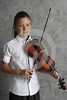 Pretty girl playing violin