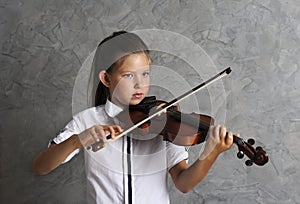 Pretty girl playing violin