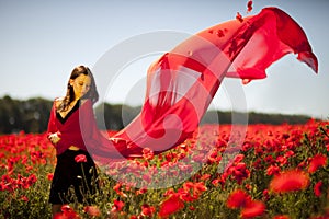 Pretty girl in the poppy field