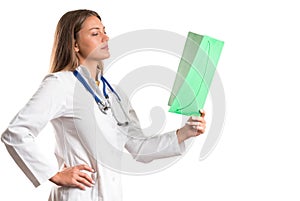 Pretty girl posing as a nurse/doctor. isolated