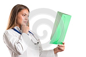 Pretty girl posing as a nurse/doctor. isolated