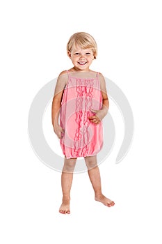 Pretty girl posing for the camera, in a pink short dress