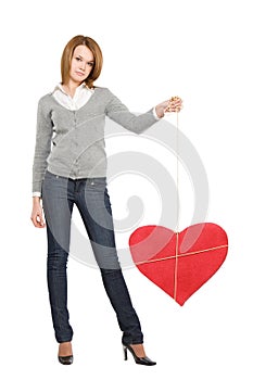 Pretty girl with red bounded heart photo