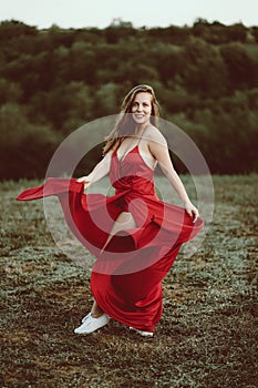 A pretty girl in a red dress