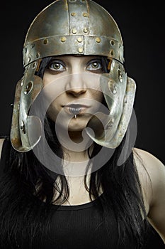 Pretty girl with roman helmet