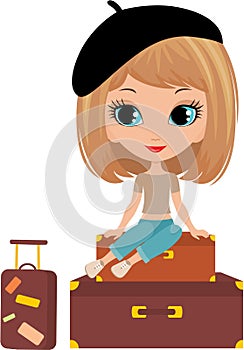 Pretty girl sits on a suitcase