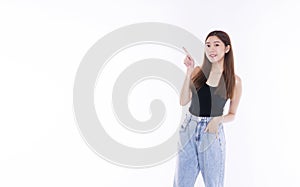 Pretty girl smile point presentation advertisement. Cheerful young woman use finger pointing to product or empty copy space while