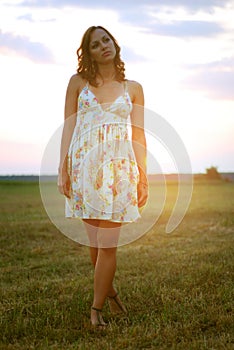 Pretty girl in a summer field