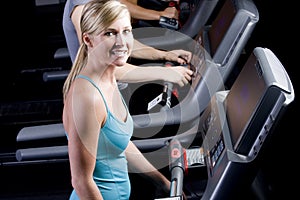 Pretty girl on a treadmill