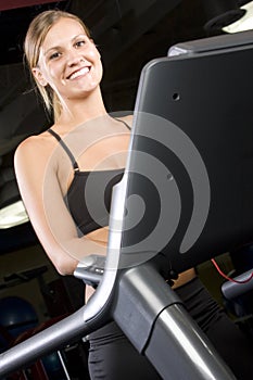 Pretty girl on a treadmill