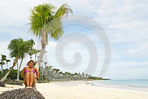 Pretty girl on a tropical beach