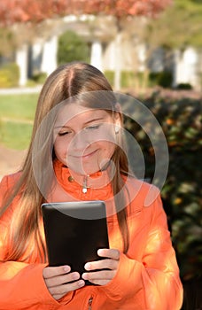 Pretty girl using her tablet